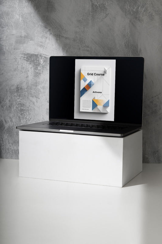 Laptop on a white stand with a gray concrete wall background