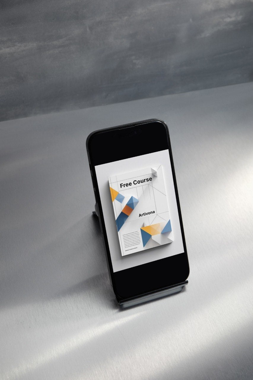 Phone with a free course app on a gray surface